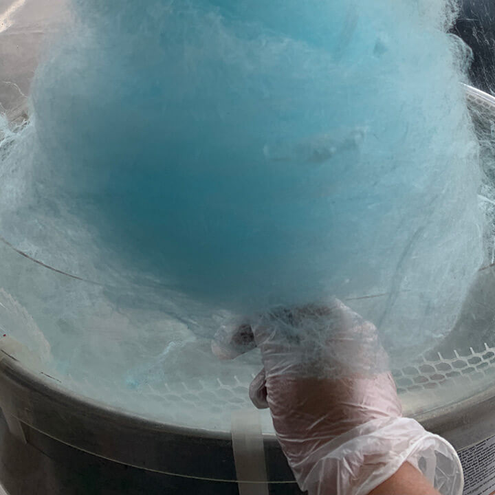 Blue fairy floss on a stick.