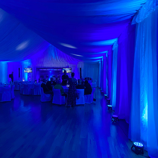 Blue wedding lighting with drapes