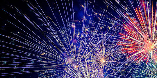 Rockets going off in red and blue.